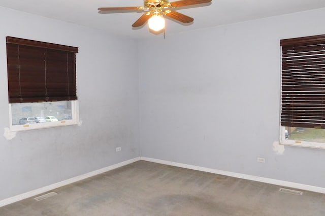 carpeted empty room with ceiling fan