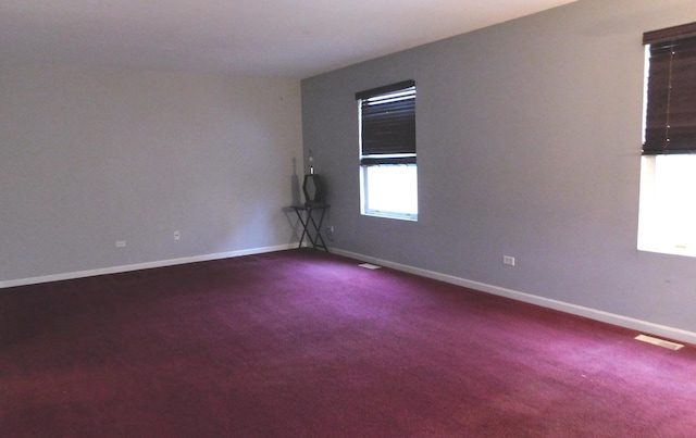 unfurnished room featuring carpet floors