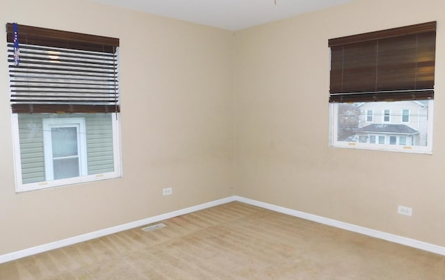 view of carpeted spare room