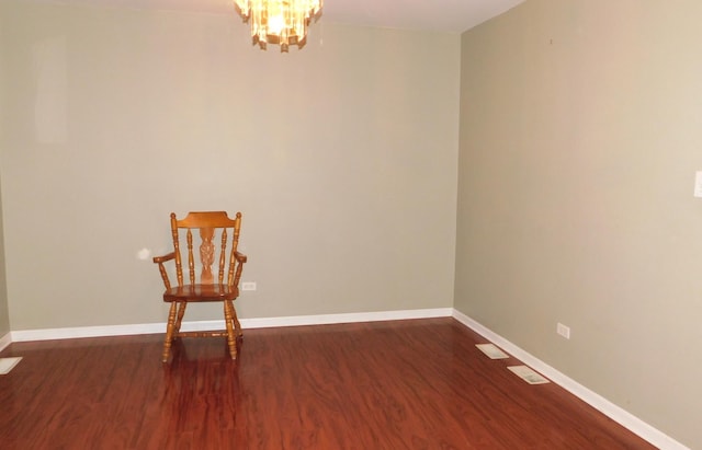 empty room with dark hardwood / wood-style floors