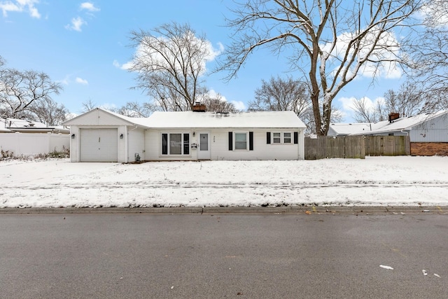 single story home with a garage