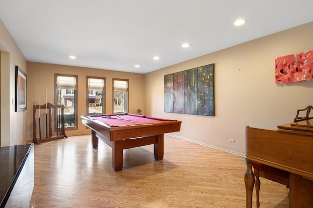 game room with billiards and light wood-type flooring