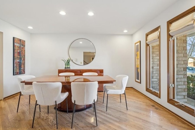 dining room featuring light hardwood / wood-style floors