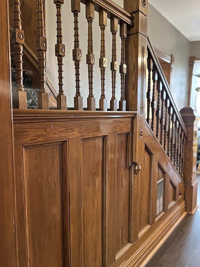 stairway with wood-type flooring