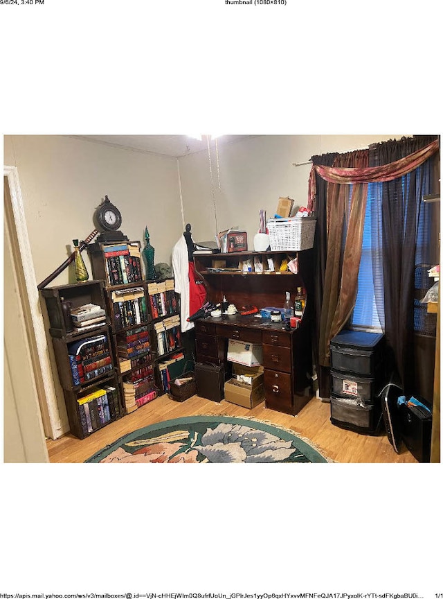 office space with light hardwood / wood-style floors