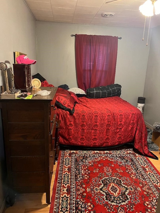 bedroom featuring hardwood / wood-style floors