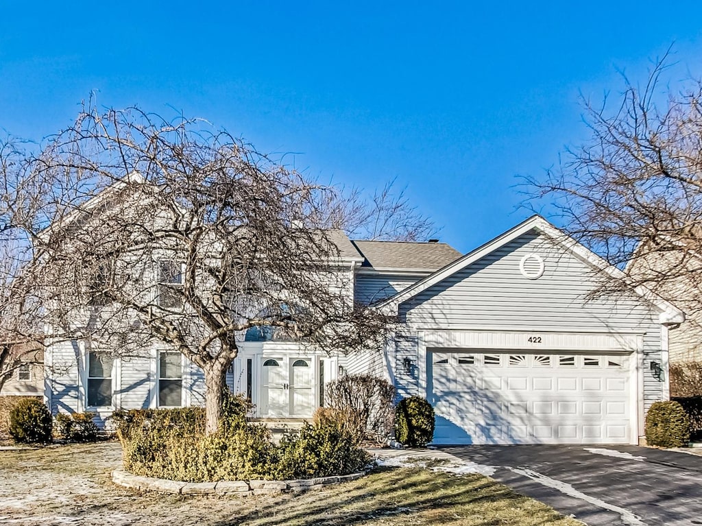 front of property featuring a garage