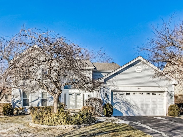 front of property featuring a garage