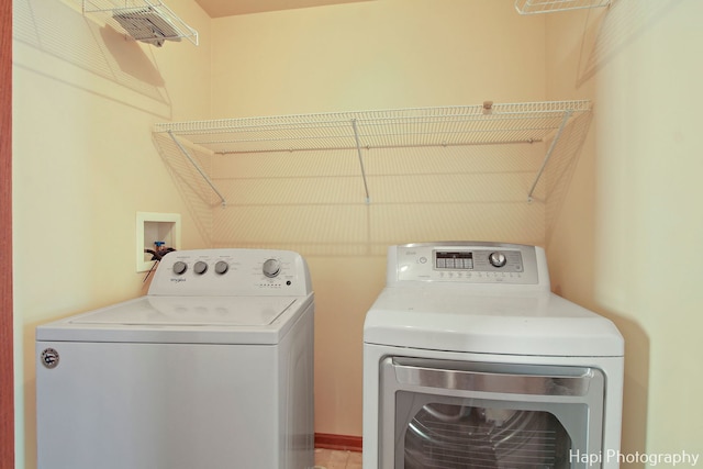 laundry room with washer and dryer