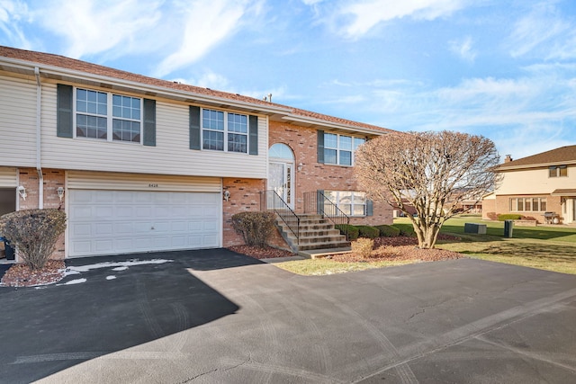 raised ranch with a garage