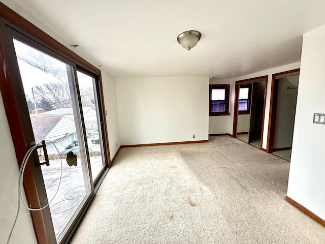 empty room with carpet flooring