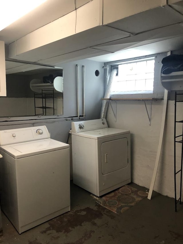 washroom featuring washer and dryer