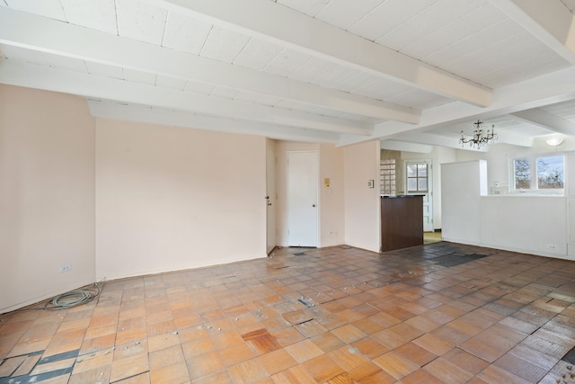 unfurnished room featuring beamed ceiling and an inviting chandelier