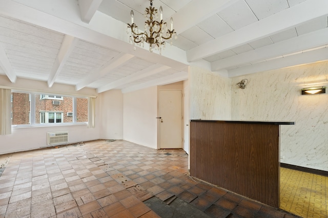 unfurnished living room with beamed ceiling and a notable chandelier