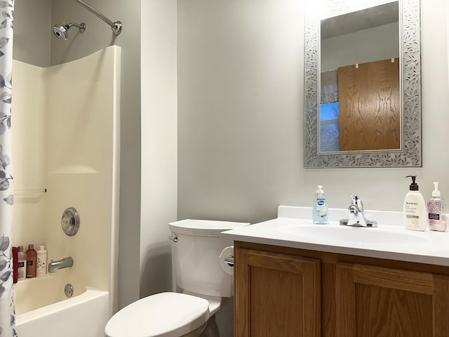 full bathroom featuring shower / bath combination with curtain, toilet, and vanity