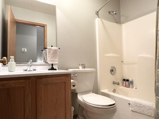 full bathroom with shower / tub combination, vanity, and toilet