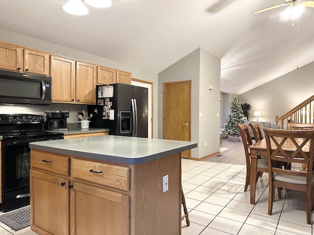 kitchen with lofted ceiling, a center island, black range with electric stovetop, and fridge with ice dispenser