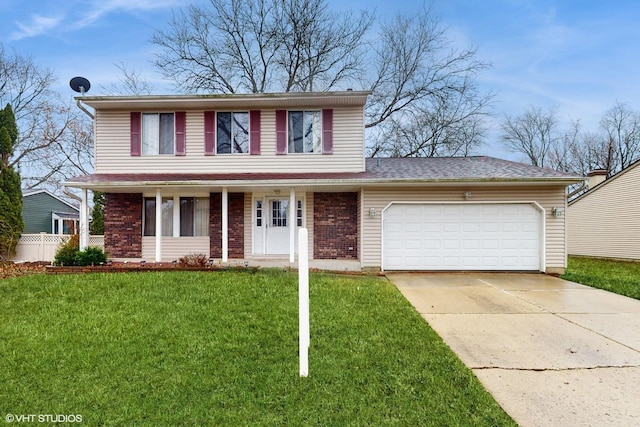 view of front of house with covered porch, a front yard, and a garage