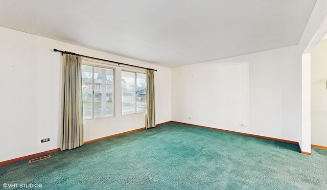 empty room featuring carpet floors