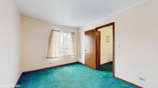 unfurnished bedroom featuring carpet