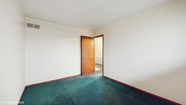 spare room with carpet floors