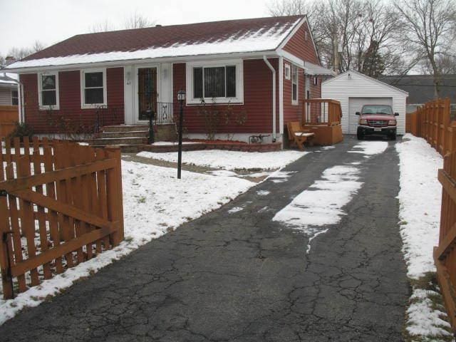 417 N Park Ave, Aurora, IL 60506 - bungalow-style house with an outbuilding and a garage
