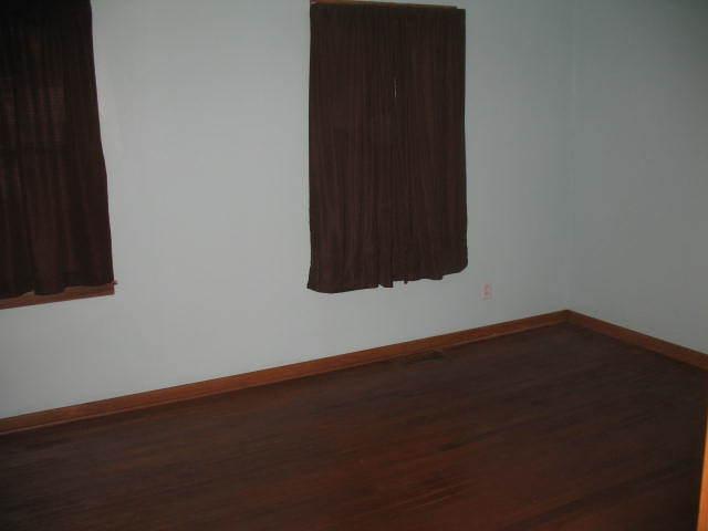 417 N Park Ave, Aurora, IL 60506 - spare room with hardwood / wood-style floors