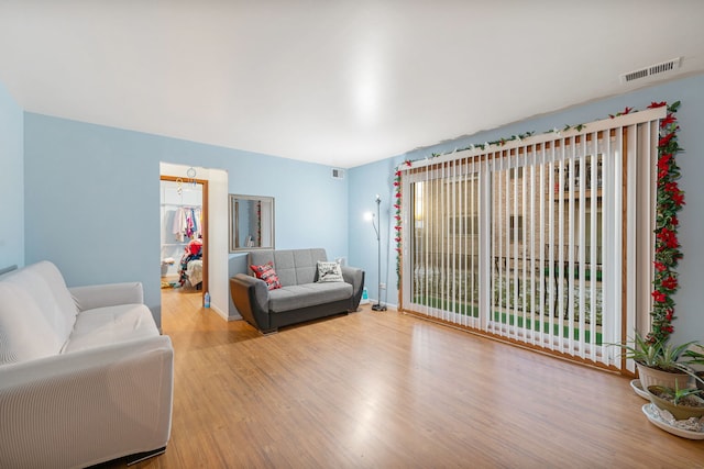 living room featuring light wood-type flooring