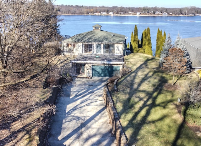 exterior space with a water view