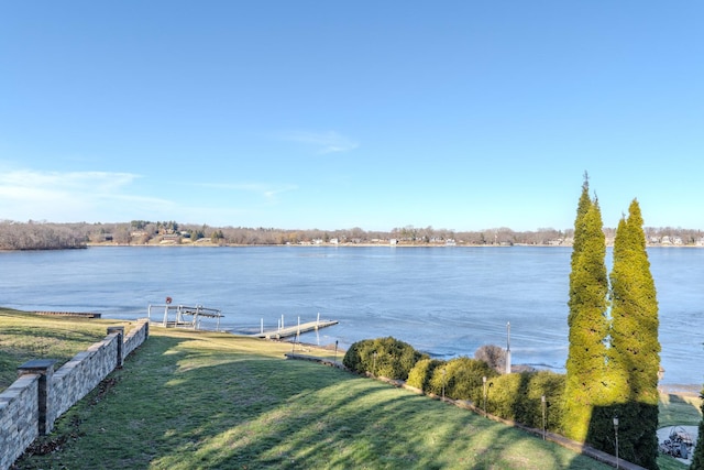 view of water feature with a dock