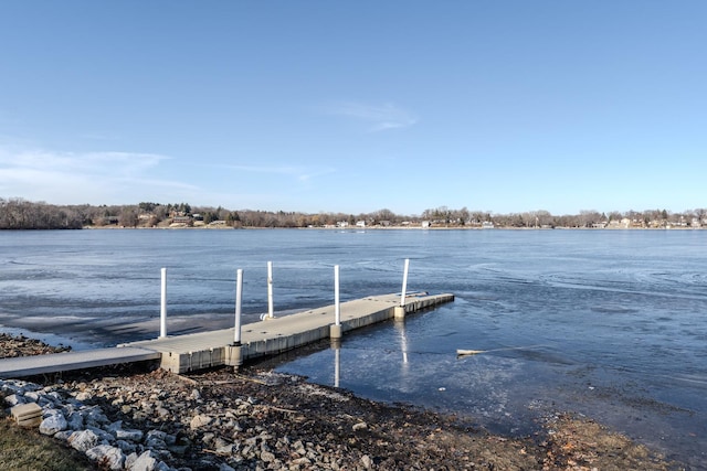 view of dock with a water view