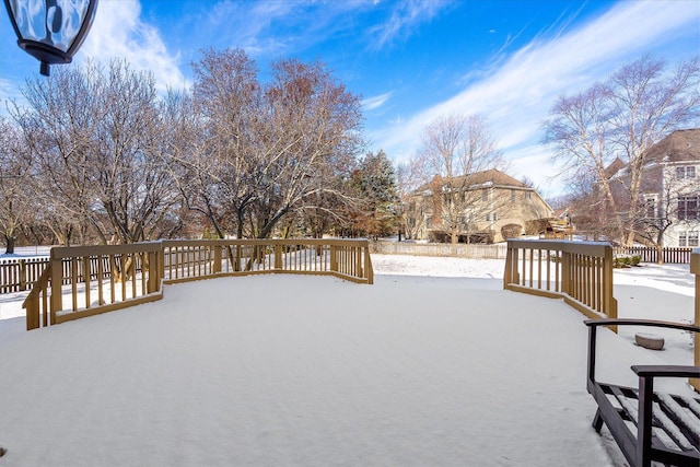 view of snow covered deck