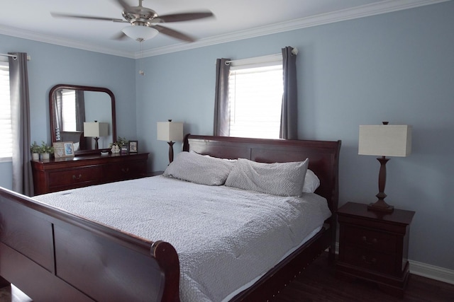 bedroom featuring ceiling fan, ornamental molding, and multiple windows