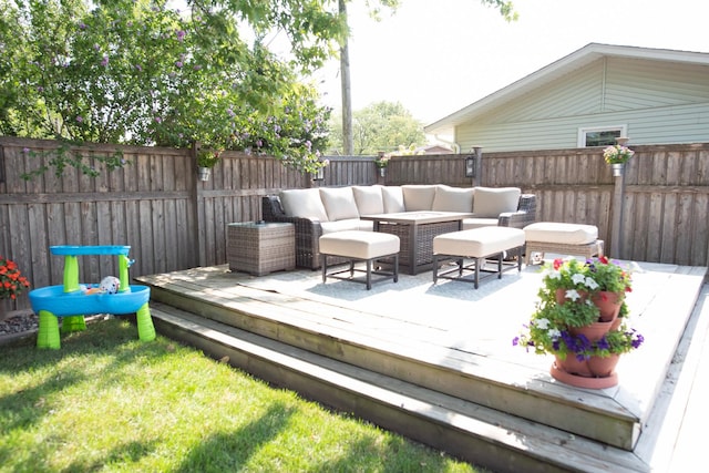 wooden terrace featuring outdoor lounge area