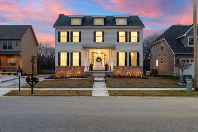 colonial-style house with cooling unit