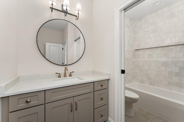 full bathroom featuring tile patterned floors, vanity, toilet, and bathing tub / shower combination