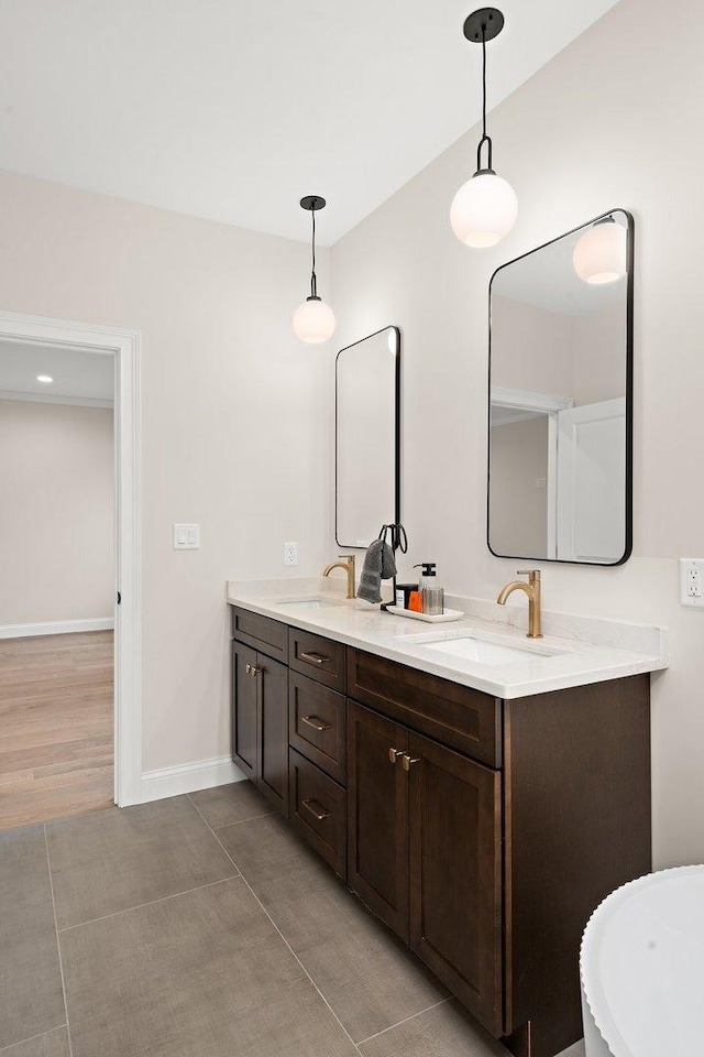 bathroom featuring tile patterned floors and vanity