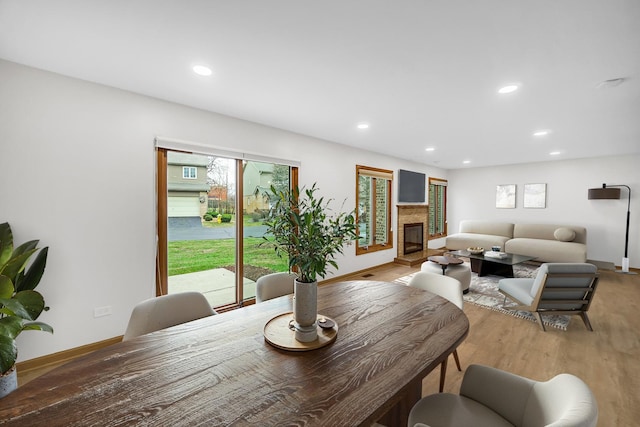 dining space featuring light hardwood / wood-style floors