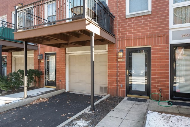 doorway to property with a balcony