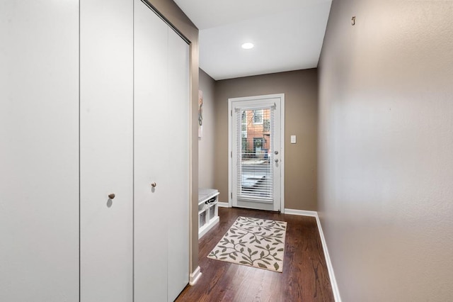 doorway featuring dark hardwood / wood-style floors