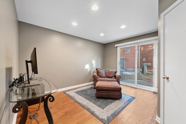 sitting room featuring hardwood / wood-style flooring