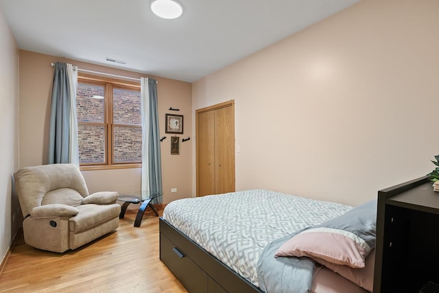 bedroom featuring light hardwood / wood-style floors