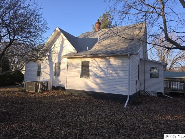 view of property exterior with central air condition unit