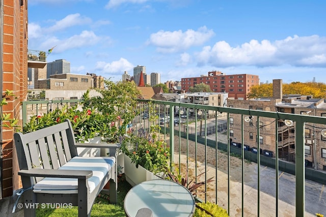 balcony featuring a view of city