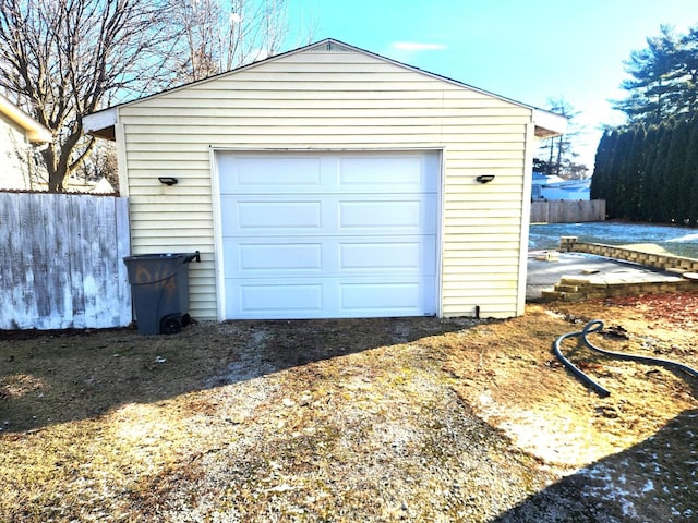 garage with fence