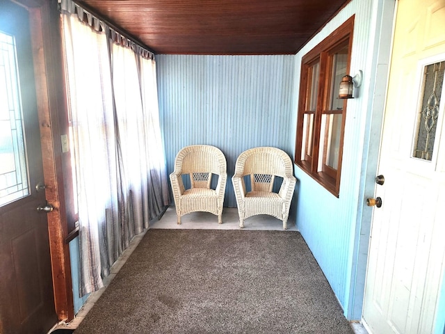 sunroom with wooden ceiling