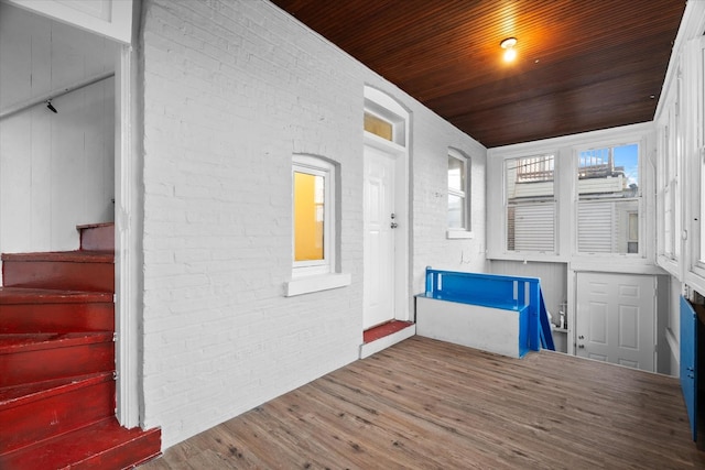 interior space featuring wooden ceiling