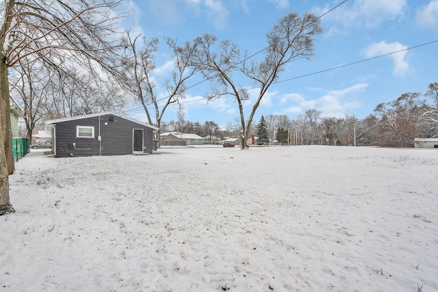 view of yard covered in snow