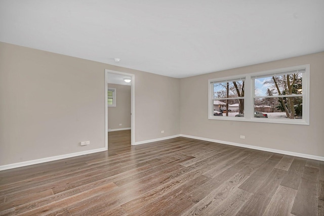 empty room featuring hardwood / wood-style flooring