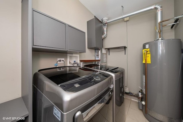 laundry room featuring separate washer and dryer, gas water heater, cabinets, and light tile patterned flooring